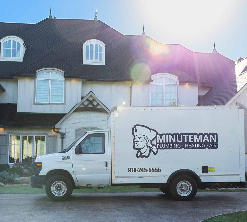 minuteman plumbing heating and air van to work on furnace at home